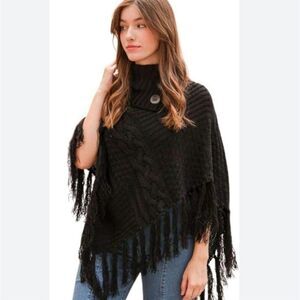 PURE HANDKNITT Turtleneck Cable Knit Poncho With Tassels